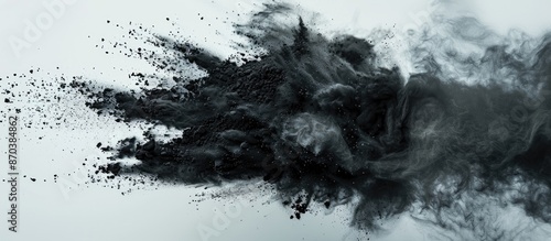 Wallpaper Mural Capture the dynamic moment of black powder exploding or dispersing against a blank backdrop in a vivid copy space image. Torontodigital.ca