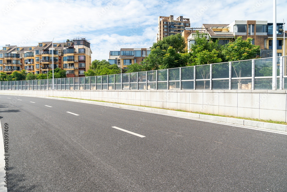 Obraz premium Empty urban road and buildings in the city