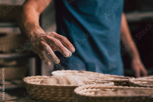 raw bread in basket in a traditional bakery