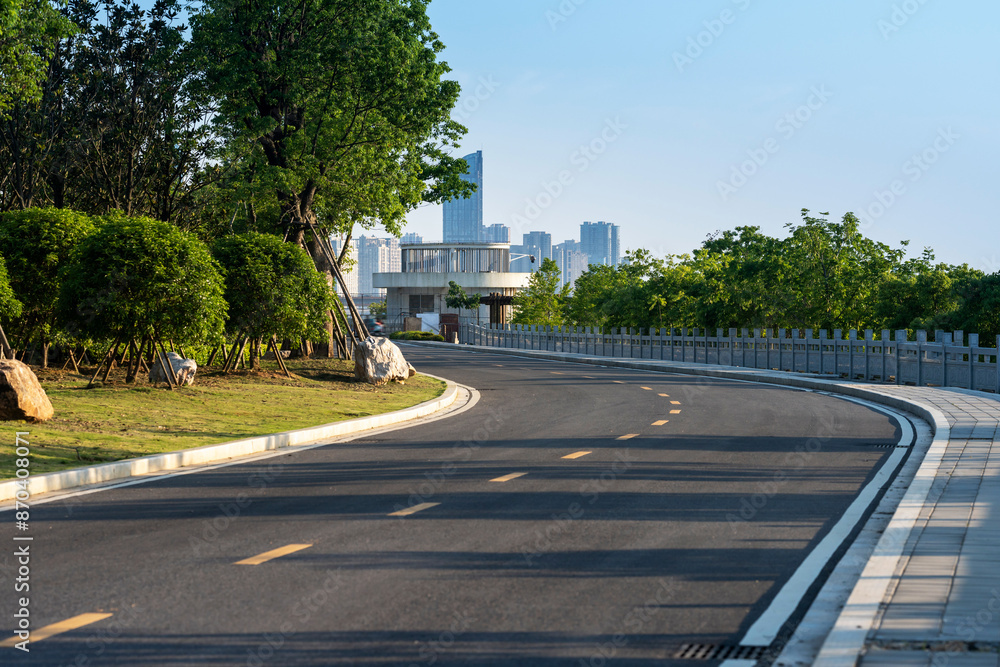 Fototapeta premium Empty urban road and buildings in the city