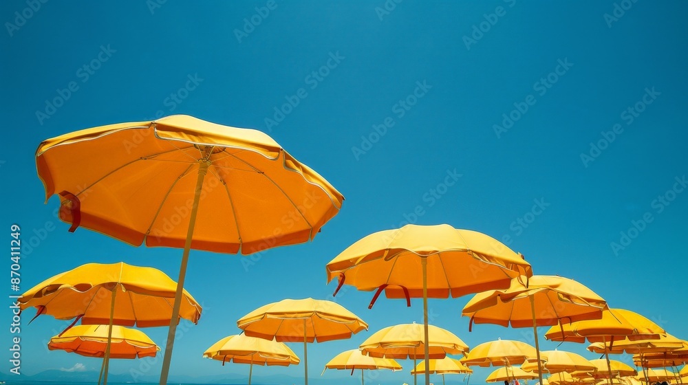 Beach umbrellas dot the landscape, offering shade from the sun's relentless rays. Beach umbrellas dot the landscape, offering shade from the sun's relentless rays.