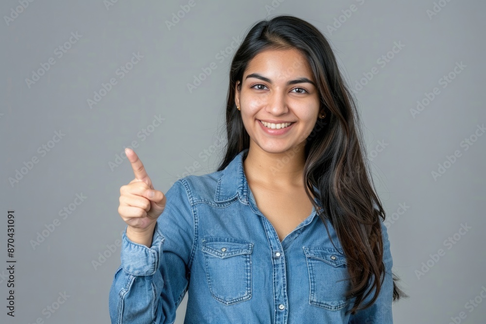 Indian student pointing at copy space confident and happy portrait Indian student pointing at copy space confident and happy portrait