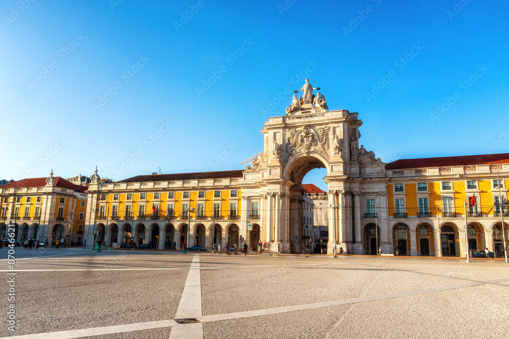 Rua Augusta Arch at dusk in Lisbon, Portugal. View from the Commerce Square (Portuguese: Praca do Comercio, Terreiro do Paco). Rua Augusta Arch at dusk in Lisbon, Portugal. View from the Commerce Square (Portuguese: Praca do Comercio, Terreiro do Paco).