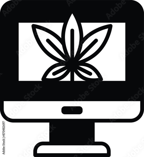 A computer monitor with a leaf on it