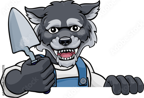 A wolf bricklayer builder construction worker mascot cartoon character holding a trowel tool and peeking around a sign