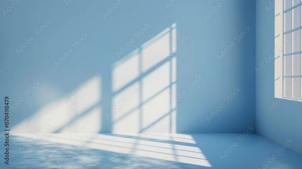 Obraz premium Serene blue room with sunlight streaming through window