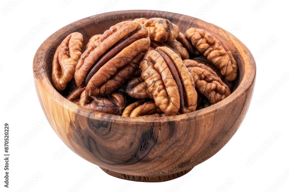 Pecans in wooden bowl isolated on transparent background Pecans in wooden bowl isolated on transparent background