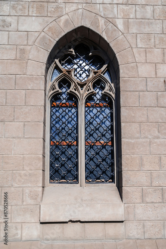 window in stone wall of the Cathedral of the Sacred Heart of Jesus in Tashkent in Uzbekistan