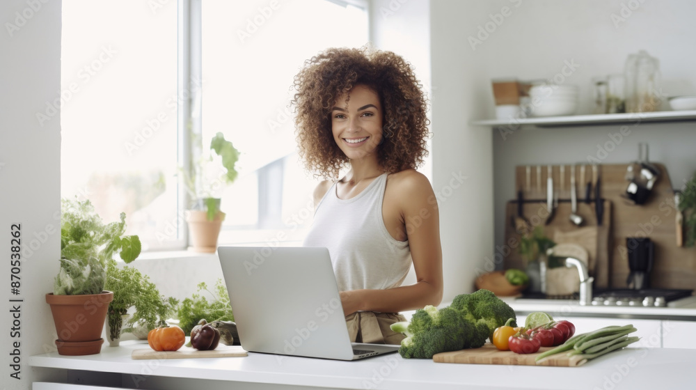 Young woman enjoys healthy cooking in her modern kitchen, using a laptop for recipes. Surrounded by fresh vegetables and herbs, she cultivates a vibrant and nutritious lifestyle at home. Young woman enjoys healthy cooking in her modern kitchen, using a laptop for recipes. Surrounded by fresh vegetables and herbs, she cultivates a vibrant and nutritious lifestyle at home.