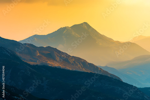 "Mountain Silhouette Against Yellow Sky"
