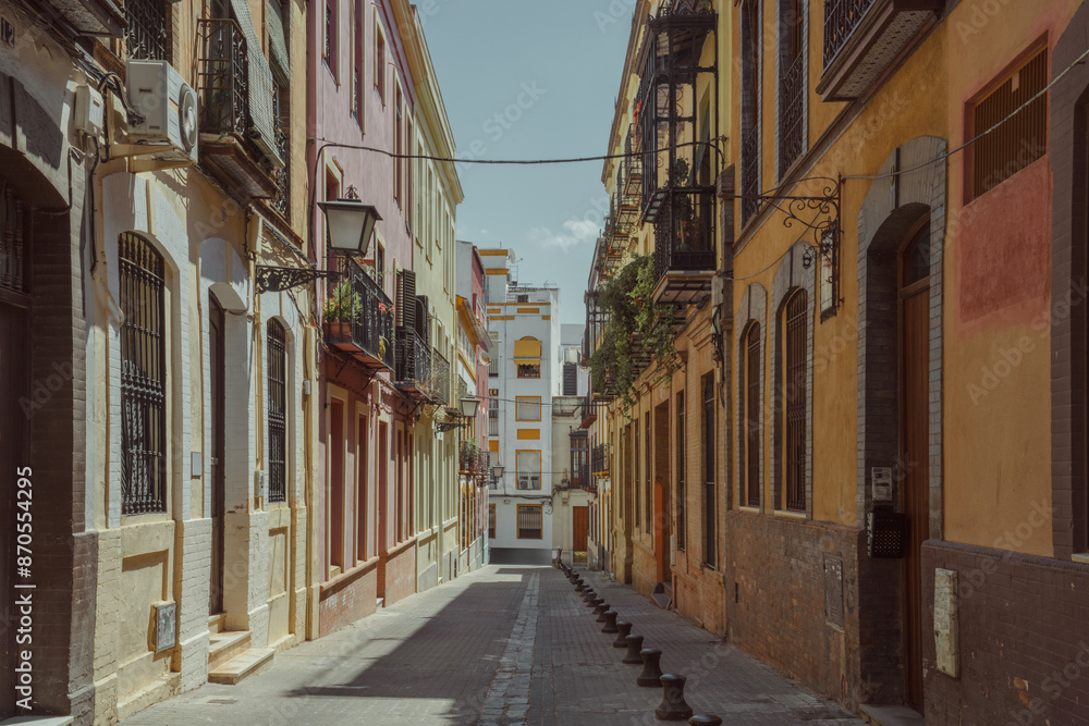 Typical street in the center of Seville, Spain Typical street in the center of Seville, Spain