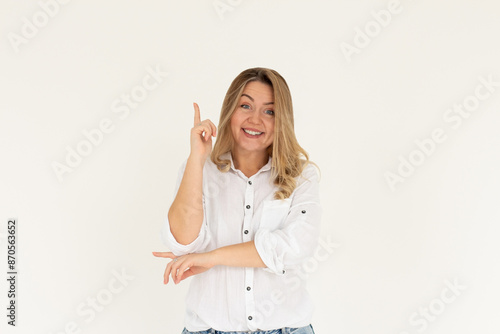 Quadro em tela Image of excited young lady standing isolated over white background