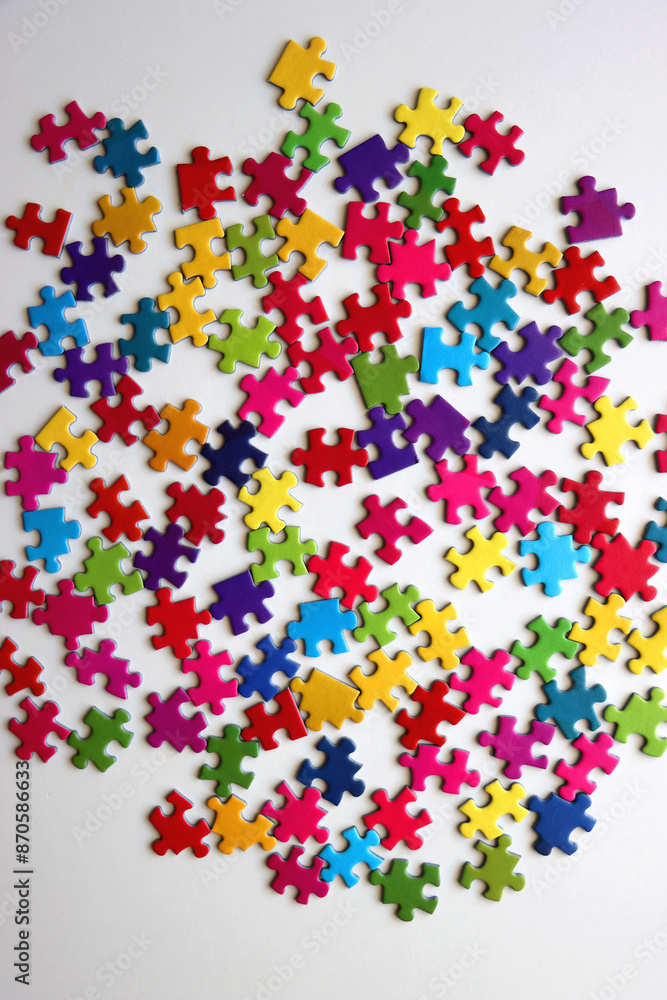 Colorful jigsaw puzzle pieces on white background. Flat lay. Colorful jigsaw puzzle pieces on white background. Flat lay.