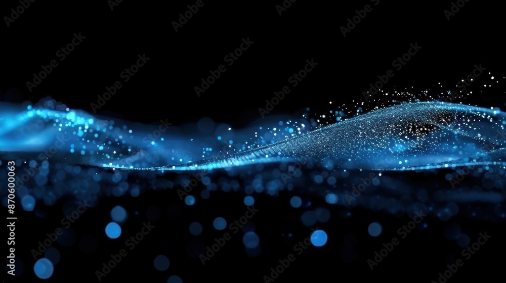 Abstract image of blue bokeh light wave against a black background, creating a futuristic and dynamic visual effect. Abstract image of blue bokeh light wave against a black background, creating a futuristic and dynamic visual effect.