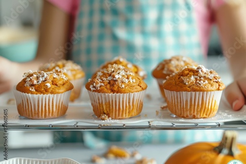 Kids learning to bake pumpkin muffins in home economics class, practical skills, back to school photo