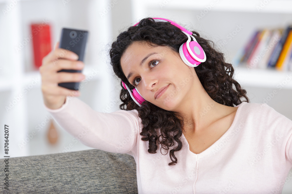Fototapeta premium a smiling woman in headphones
