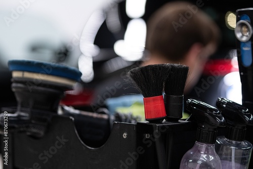 Obraz na płótnie Tools and accessories used in car detailing electric polisher, brushes for cleaning hard to reach areas. w salonie