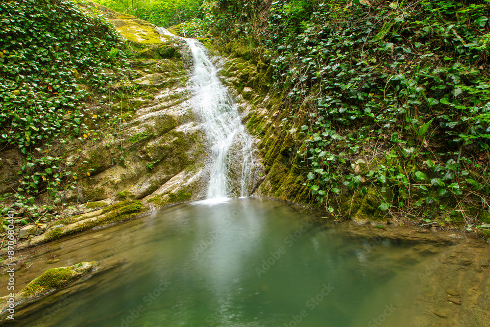 Waterfall on the river in nature in summer Waterfall on the river in nature in summer