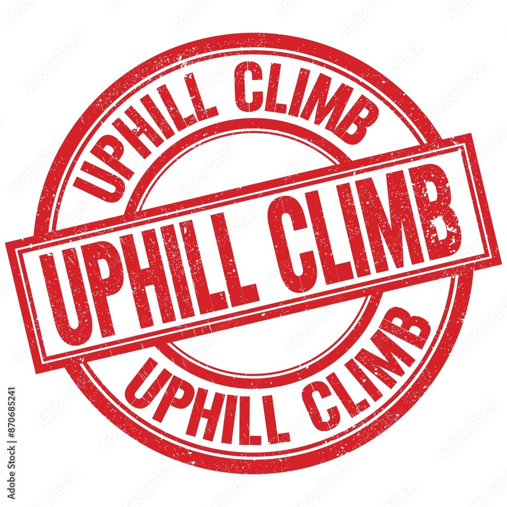 UPHILL CLIMB written word on red stamp sign UPHILL CLIMB written word on red stamp sign