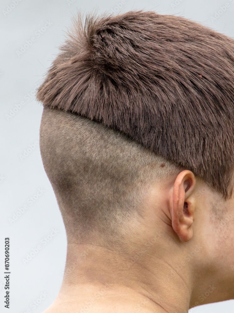 Fototapeta premium Men's cap haircut. Back view