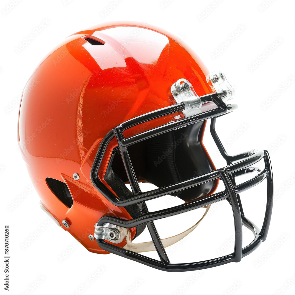 Fototapeta premium High-resolution image of an orange football helmet, perfect for sports-related projects, promoting safety gear, or athletic-related designs.