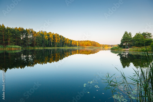 A calm and silent morning at a small lake. Location place Small Polissya, Ukraine, Europe. Beauty of earth. photo