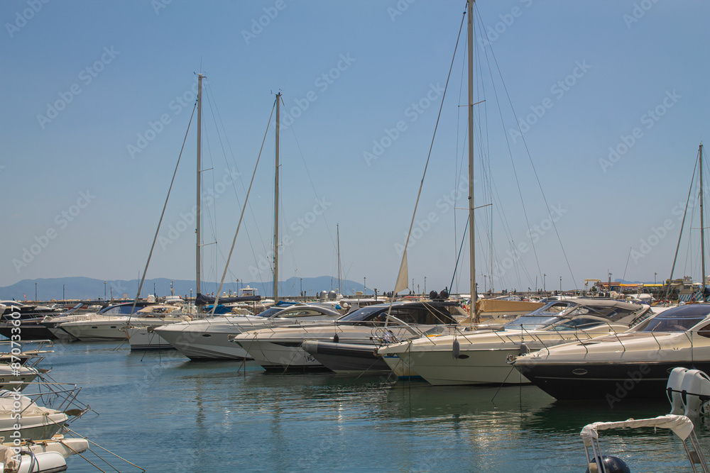 Boats in the marina. Beautiful white yachts parked on the sea coast, Naples, Italy Boats in the marina. Beautiful white yachts parked on the sea coast, Naples, Italy