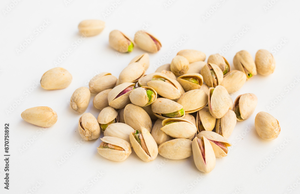 Delicious pistachios on a white background Delicious pistachios on a white background