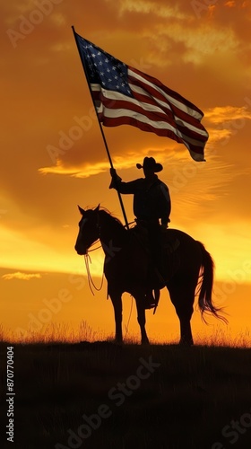 Cowboy on horseback holding american flag against sunset