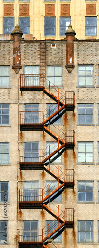 Obraz na plátně Rusty Fire Escape Climbs Old Building in Memphis