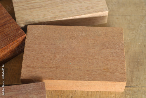 Pile of cut wooden blocks and planks, wood material