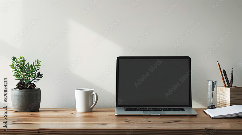 Minimalist desk setup with a laptop and coffee mug, ample copy space for banners. Minimalist desk setup with a laptop and coffee mug, ample copy space for banners.
