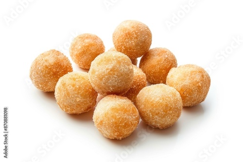 A pile of sugar-coated doughnuts on a white surface, suitable for food or baking related uses