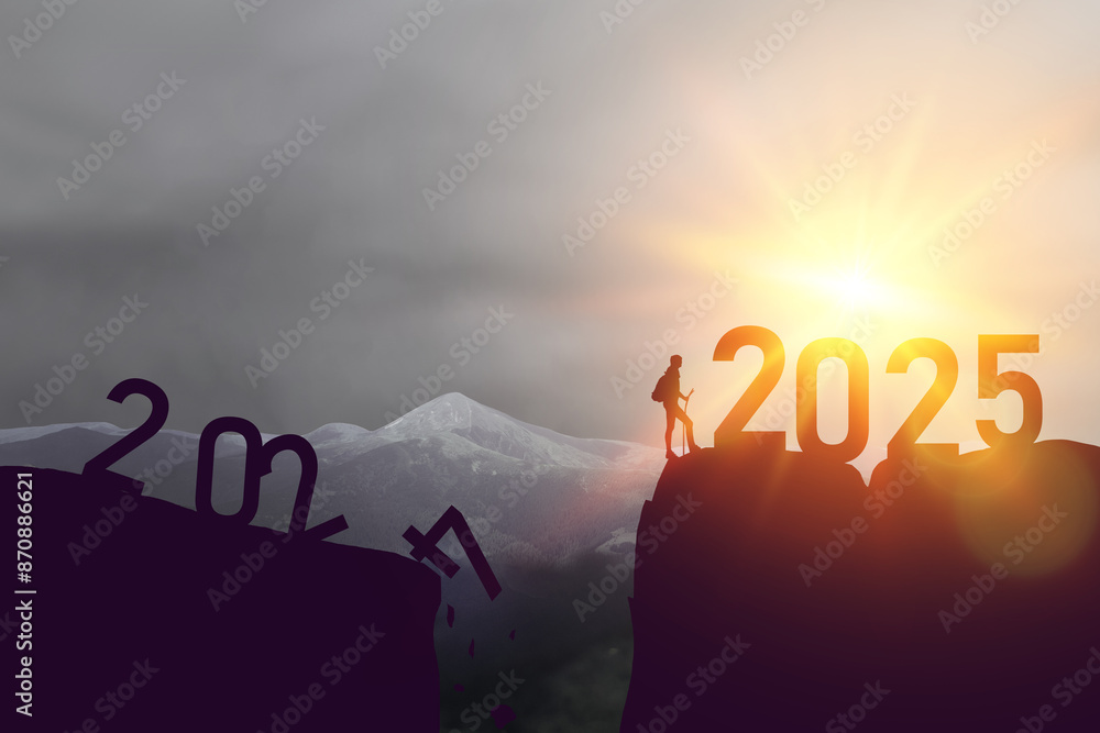 New year 2025 or straight forward concept. Text 2024 to 2025 written on the mountain top with at sunrise. Concept of planning, goal, challenge, new year resolution and start. High quality photo