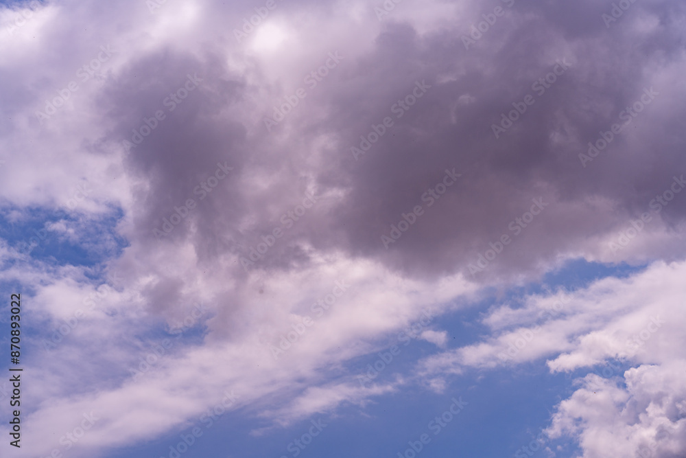 Fototapeta premium The sky is blue with a few clouds scattered throughout