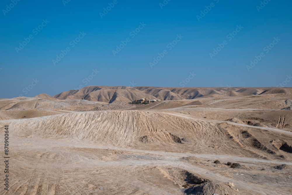 An Nabi Musa Mosque and Oasis Garden Seen From Afar in the Middle of a White Desert Against Clear Blue Sky