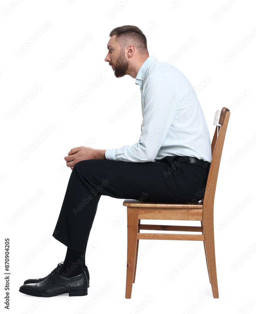 Man with poor posture sitting on chair against white background Man with poor posture sitting on chair against white background