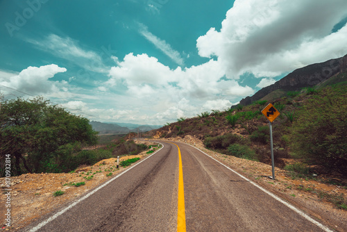 Landscape photography of the Sierra Gorda of Queretaro and its highway, with a view mainly of mountains and desert with a beautiful blue sky. photo