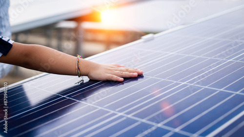 father and daughter by solar panel