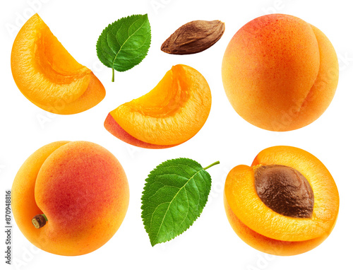 Set of whole apricots, halves and apricot slices with leaves isolated on a transparent background.