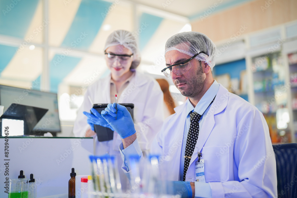 scientist doctors wear lab coat. Chemicals serums and antibiotics are being tested for treatment of people and animals. and make dietary supplements. product testing room clean in a modern laboratory. scientist doctors wear lab coat. Chemicals serums and antibiotics are being tested for treatment of people and animals. and make dietary supplements. product testing room clean in a modern laboratory.