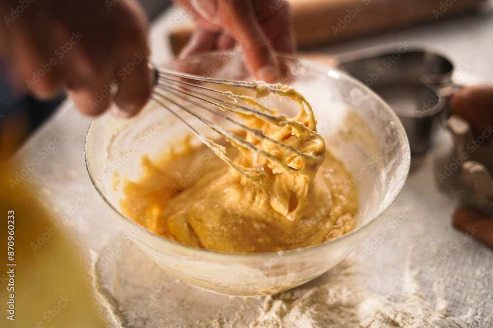Fototapeta premium Mixing Batter for Baking in glass bowl