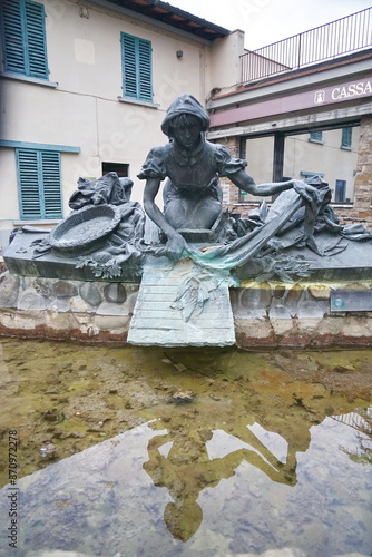 Laundress fountain in Umberto I square in Grassina, Tuscany, Italy