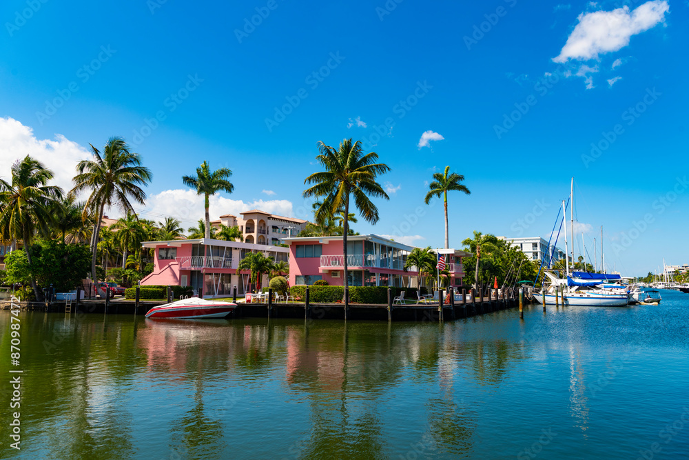 Summer vacation in tropical residential house. Luxury summer villa with yacht pier. Vacation in summer paradise. Luxury house apartment at summertime. Travel to bay at Florida. Residential mansion Summer vacation in tropical residential house. Luxury summer villa with yacht pier. Vacation in summer paradise. Luxury house apartment at summertime. Travel to bay at Florida. Residential mansion