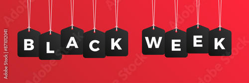 Black week sale price tag hanging on background