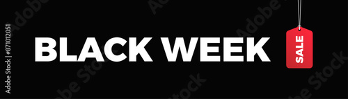 Black week sale price tag hanging on background