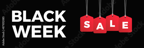 Black week sale price tag hanging on background
