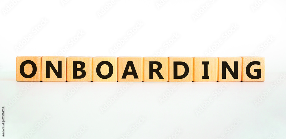 Onboarding success symbol. Concept word Onboarding on wooden blocks. Beautiful white background. Business onboarding success concept. Copy space. Onboarding success symbol. Concept word Onboarding on wooden blocks. Beautiful white background. Business onboarding success concept. Copy space.