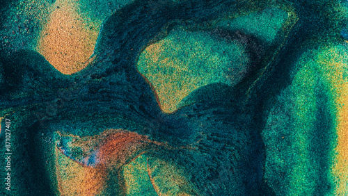 A green and brown abstract painting with a lot of texture