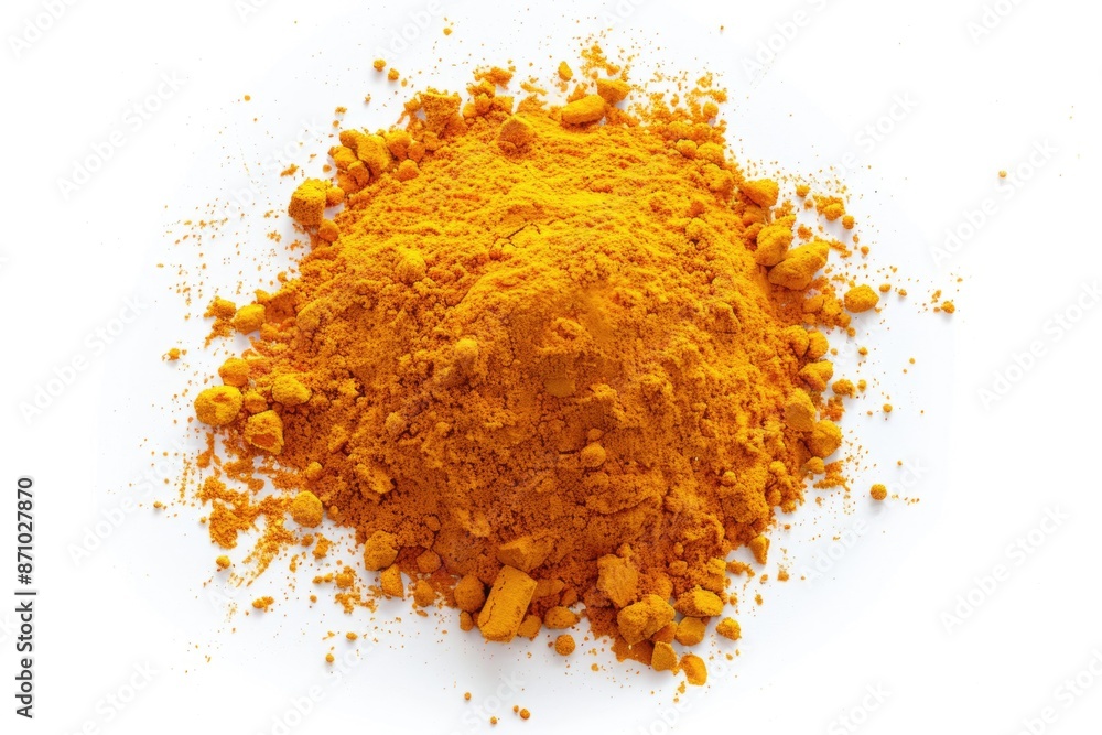 A pile of bright yellow powder on a white surface A pile of bright yellow powder on a white surface